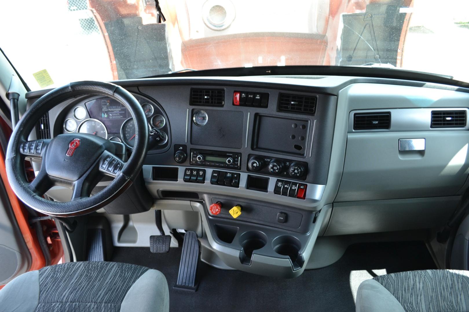 2020 ORANGE /BLACK KENWORTH T680 with an PACCAR MX13 12.9L 455HP engine, PACCAR PO-16F112C 12SPD AUTOMATED transmission, located at 9172 North Fwy, Houston, TX, 77037, (713) 910-6868, 29.887470, -95.411903 - Photo#15